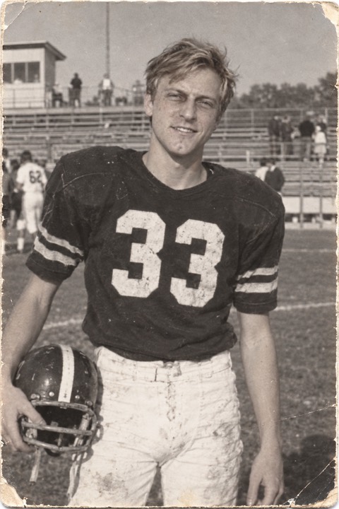 The same man at eighteen in a high school football uniform